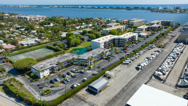 bird's eye view featuring a water view and a city view