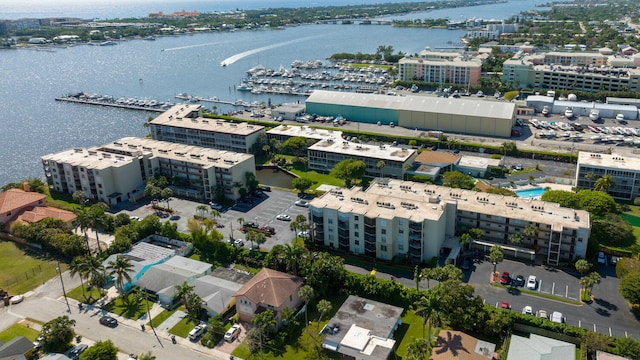 aerial view featuring a water view and a city view