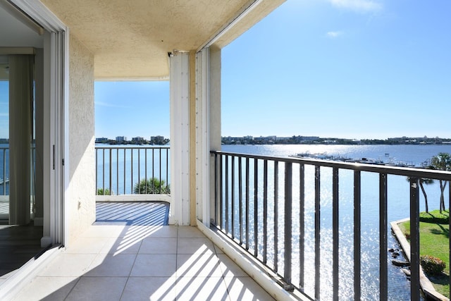 balcony featuring a water view