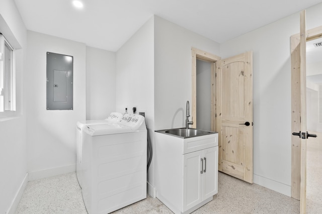 laundry room with a sink, separate washer and dryer, laundry area, electric panel, and baseboards