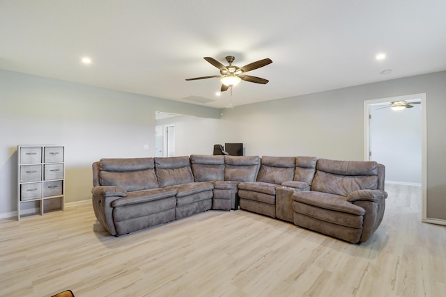 living area featuring ceiling fan, recessed lighting, wood finished floors, and baseboards