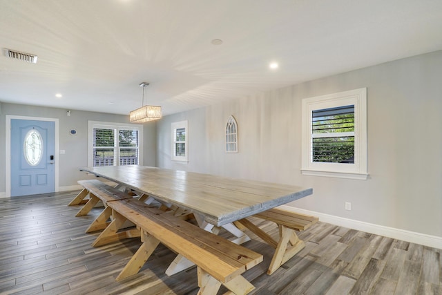 dining area featuring recessed lighting, visible vents, baseboards, and wood finished floors