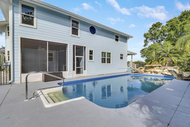 pool with a patio area