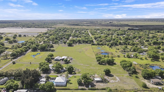 bird's eye view featuring a rural view and a water view