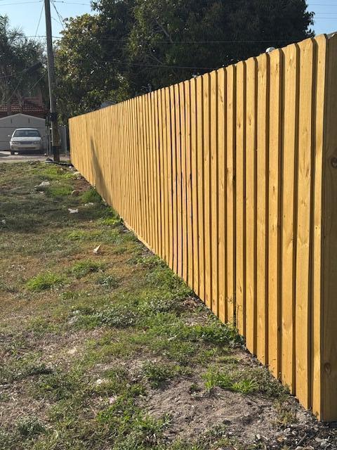 view of yard featuring fence