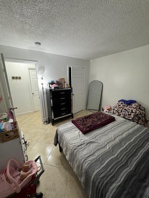 bedroom with a textured ceiling