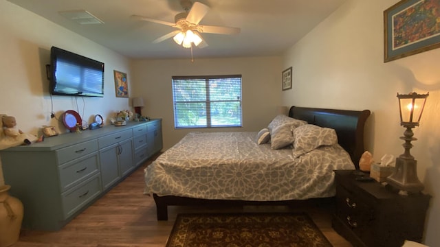 bedroom featuring ceiling fan and wood finished floors