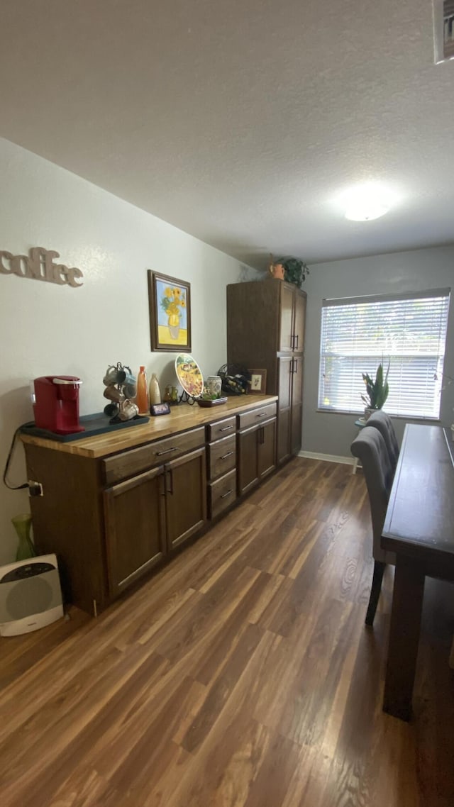 kitchen featuring dark wood finished floors