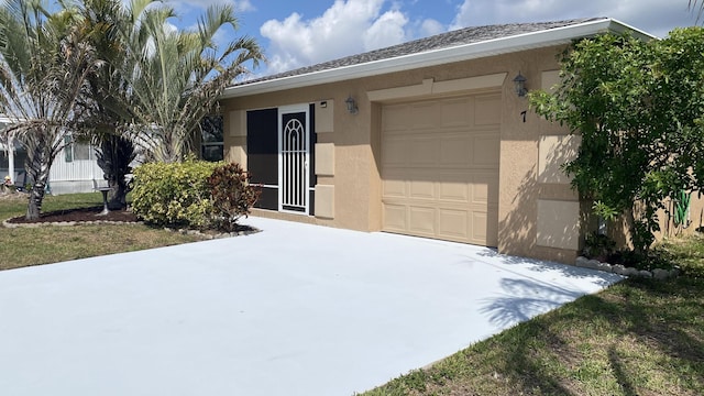 7 Los Lagos Ln, Port Saint Lucie, FL 34952 - ranch-style house with an attached garage, stucco siding, and driveway