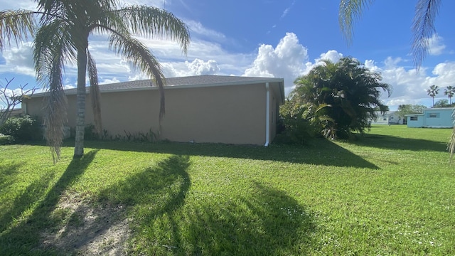 7 Los Lagos Ln, Port Saint Lucie, FL 34952 - view of green lawn