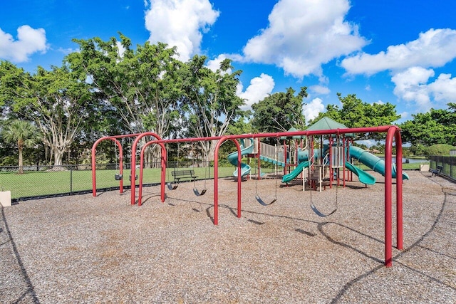 community jungle gym with fence