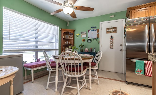 dining room featuring a ceiling fan and light tile patterned flooring