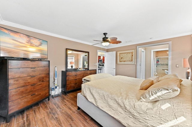 bedroom featuring ornamental molding, wood finish floors, and ceiling fan