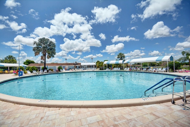 pool featuring a patio area