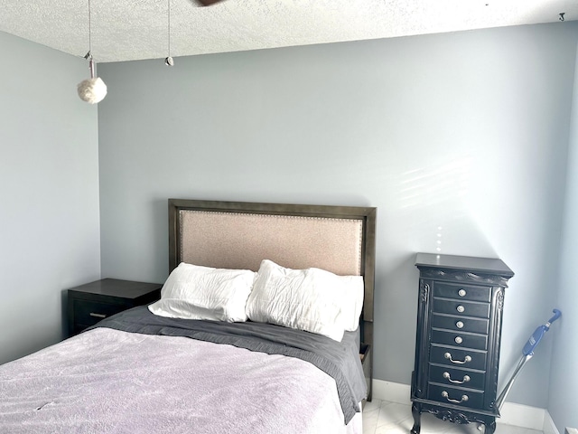 bedroom with a textured ceiling