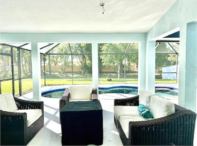 sunroom / solarium with a pool