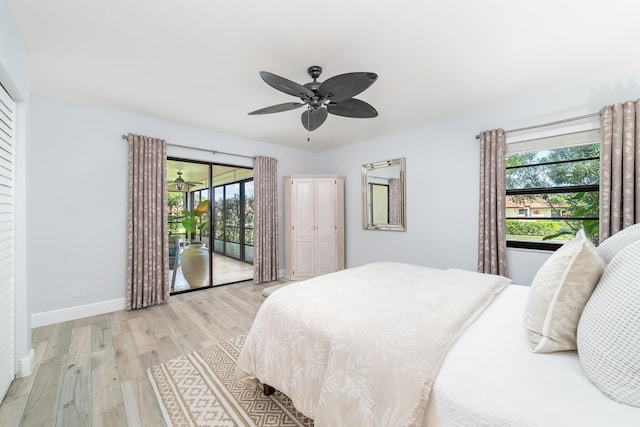 bedroom with baseboards, a ceiling fan, light wood-style flooring, and access to exterior