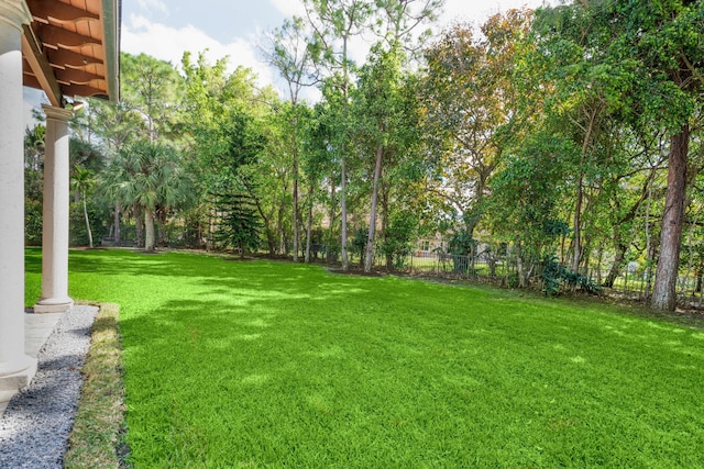 view of yard with fence