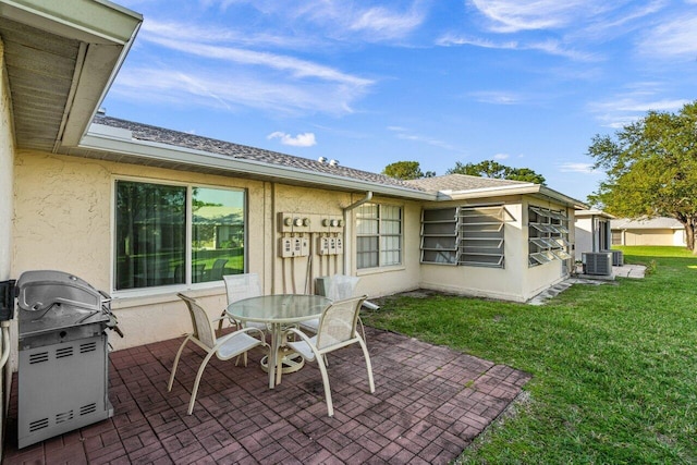 view of patio / terrace featuring central AC, outdoor dining area, and grilling area