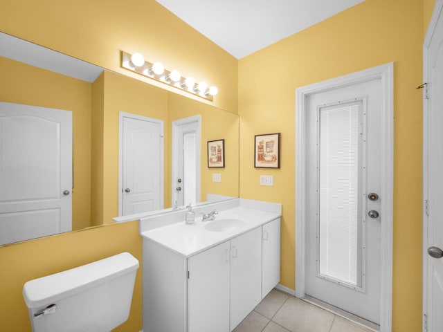10282 Hunt Club Ln, Palm Beach Gardens, FL 33418 - bathroom featuring vanity, toilet, tile patterned floors, and baseboards