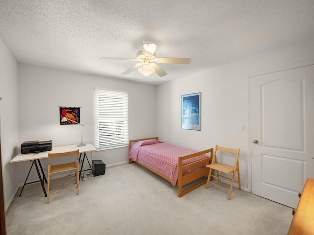 10282 Hunt Club Ln, Palm Beach Gardens, FL 33418 - carpeted bedroom featuring baseboards, ceiling fan, and a textured ceiling