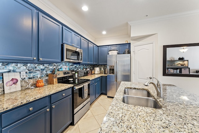 kitchen with tasteful backsplash, ornamental molding, appliances with stainless steel finishes, blue cabinets, and a sink