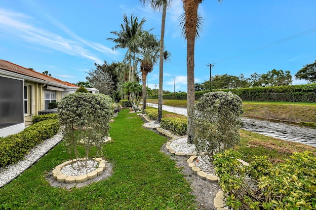 view of yard with a water view