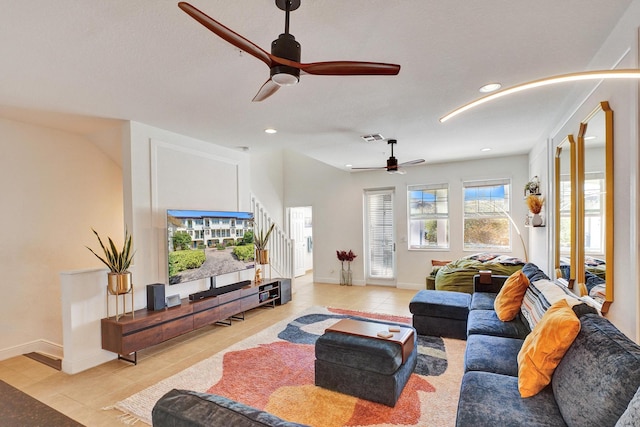 living room with recessed lighting, stairs, visible vents, and light tile patterned flooring