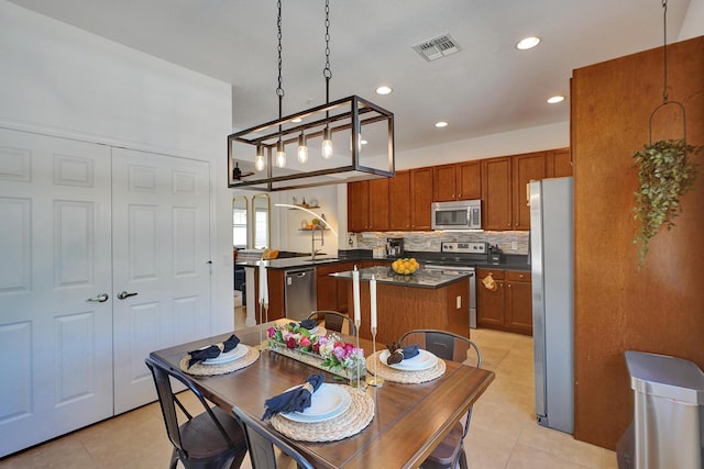 dining space with recessed lighting, visible vents, and light tile patterned floors