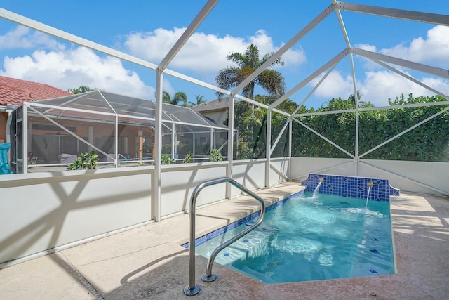 pool featuring a patio area and a lanai