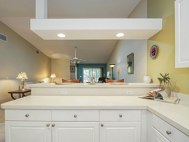 bathroom featuring visible vents, vanity, and a ceiling fan