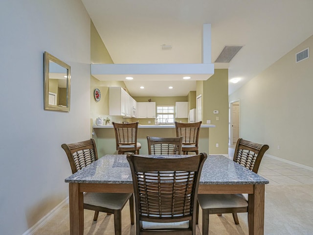 dining room with recessed lighting, baseboards, visible vents, and light tile patterned floors