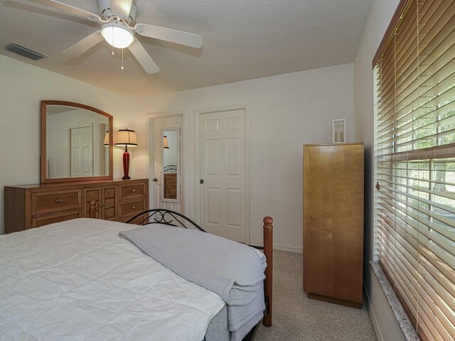 946 S Easy St, Sebastian, FL 32958 - carpeted bedroom with visible vents and ceiling fan