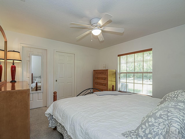 946 S Easy St, Sebastian, FL 32958 - bedroom with a textured ceiling, a ceiling fan, and carpet floors