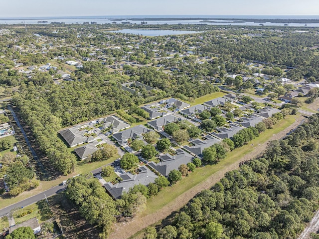 aerial view with a residential view and a water view