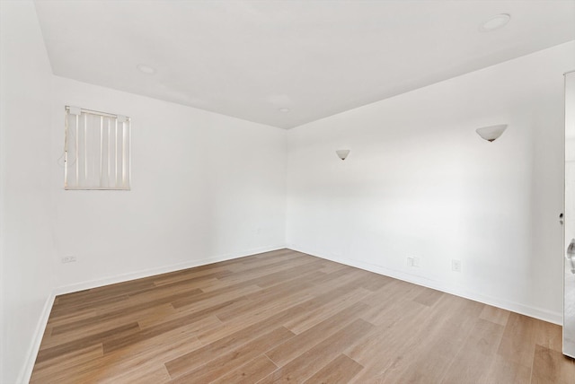 6560 Hayes St, Hollywood, FL 33024 - spare room with light wood-style flooring and baseboards