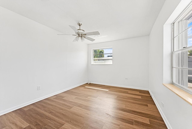 6560 Hayes St, Hollywood, FL 33024 - spare room featuring a ceiling fan, baseboards, and wood finished floors