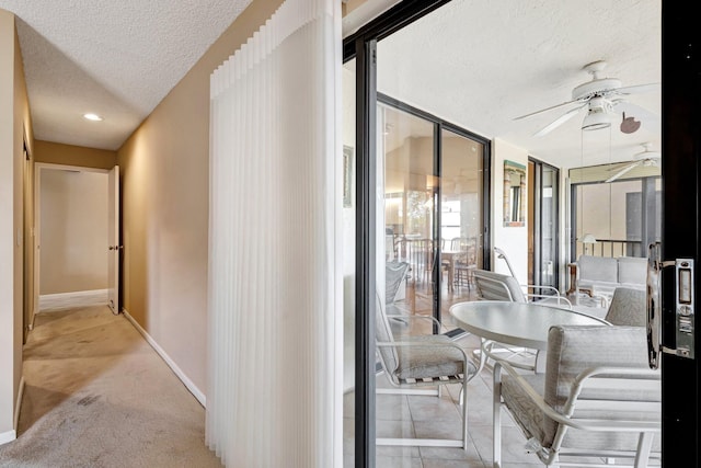 interior space with a ceiling fan