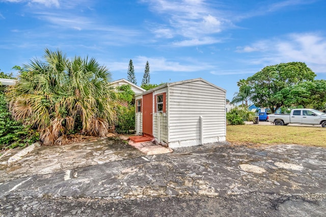 view of outbuilding with an outdoor structure