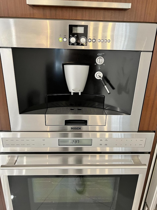 details with double oven and brown cabinets