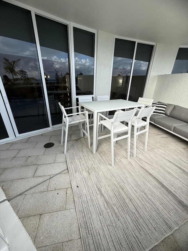 wooden deck featuring outdoor dining space