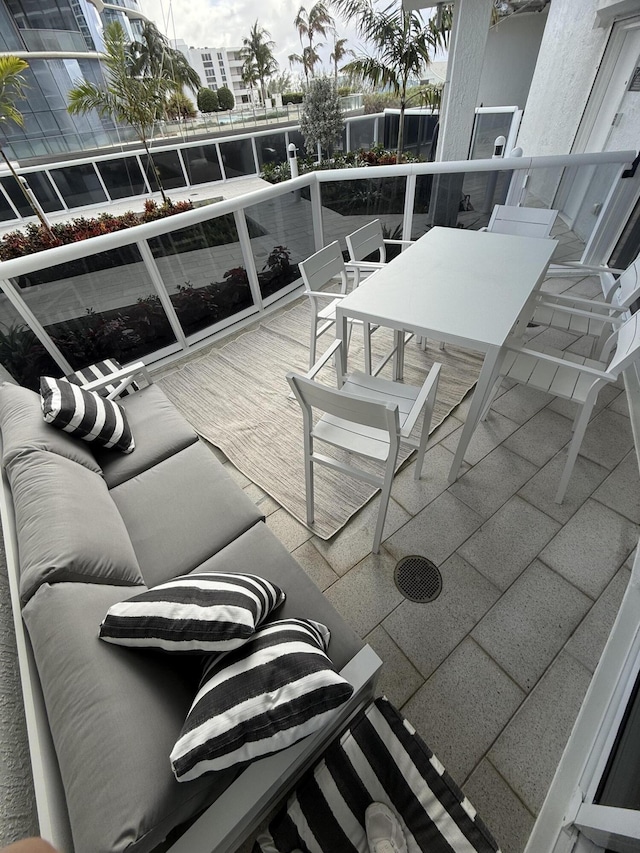 view of patio / terrace with a balcony