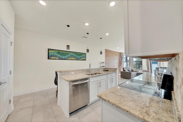 kitchen with light stone countertops, a sink, hanging light fixtures, white cabinets, and dishwasher