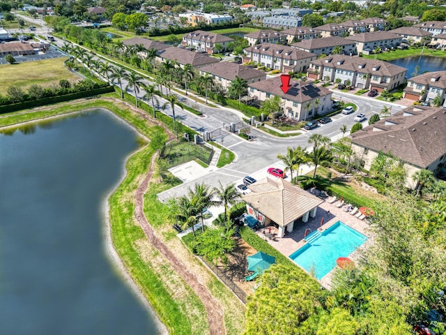 aerial view with a residential view and a water view