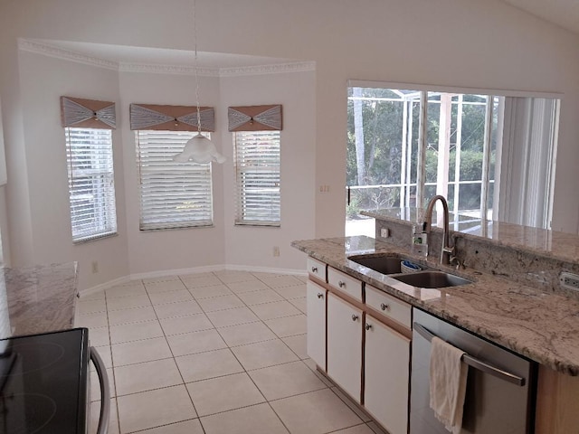 kitchen featuring a healthy amount of sunlight, dishwasher, white cabinetry, and a sink