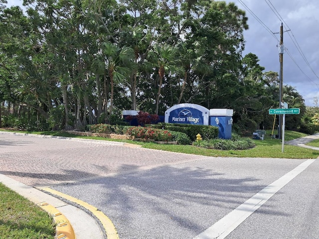 view of street featuring curbs