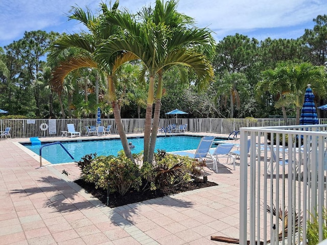 7260 SE Magellan Ln, Stuart, FL 34997 - community pool featuring a patio
