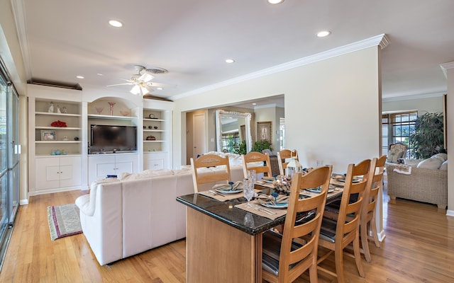 kitchen with light wood-style floors, ornamental molding, a ceiling fan, and recessed lighting