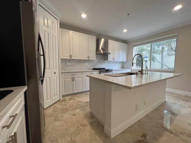 kitchen featuring a sink, marble finish floor, freestanding refrigerator, stainless steel electric range oven, and wall chimney exhaust hood