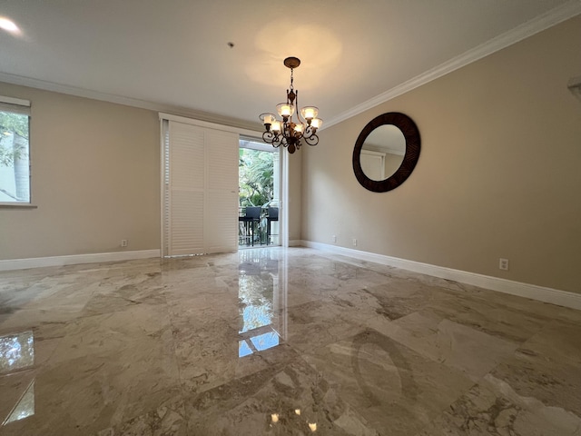 spare room featuring baseboards, marble finish floor, a wealth of natural light, and crown molding